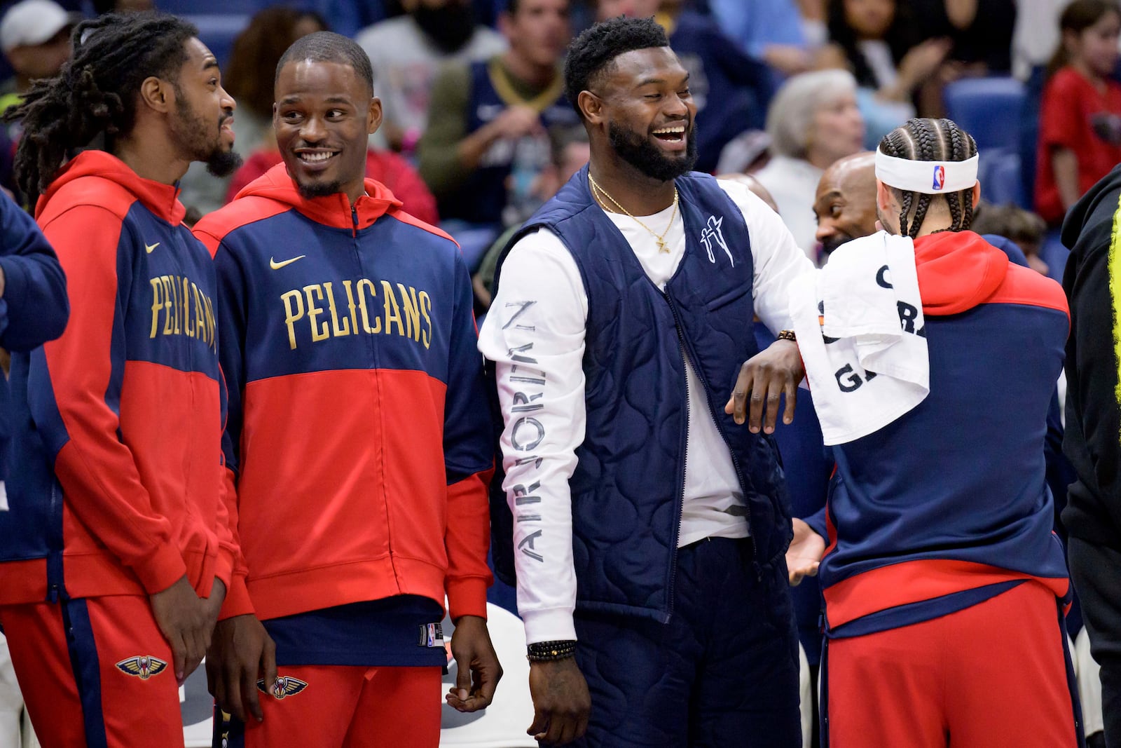 New Orleans Pelicans forward Zion Williamson, third from left, celebrates during the second half of an NBA basketball game against the Washington Wizards in New Orleans, Friday, Jan. 3, 2025. (AP Photo/Matthew Hinton)