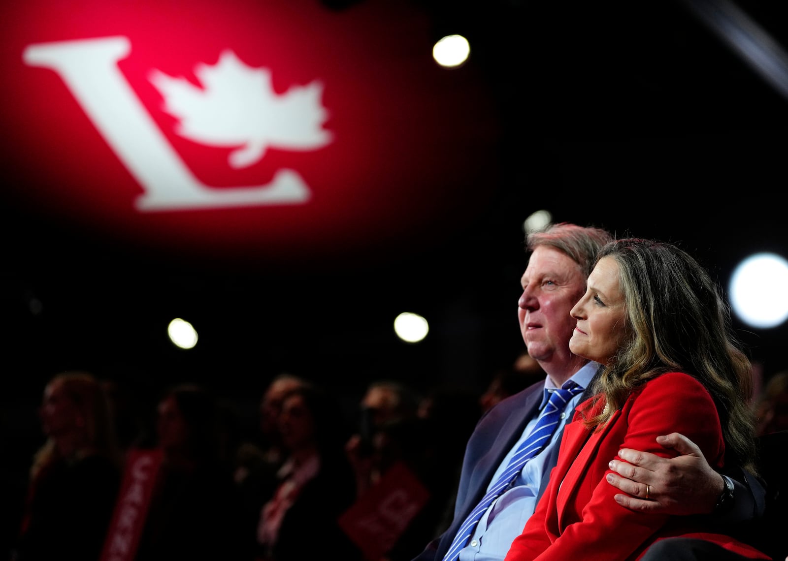 Chrystia Freeland listens to Mark Carney, Leader of the Liberal Party of Canada, not shown, speak after he was announced the winner at the Liberal Leadership Event in Ottawa, Ontario, Sunday, March 9, 2025. (Justin Tang/The Canadian Press via AP)