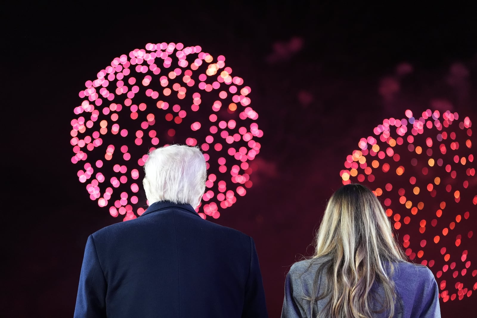 President-elect Donald Trump, Melania Trump and family watch fireworks at Trump National Golf Club, Saturday, Jan. 18, 2025, in Sterling, Va. (AP Photo/Alex Brandon, Pool)