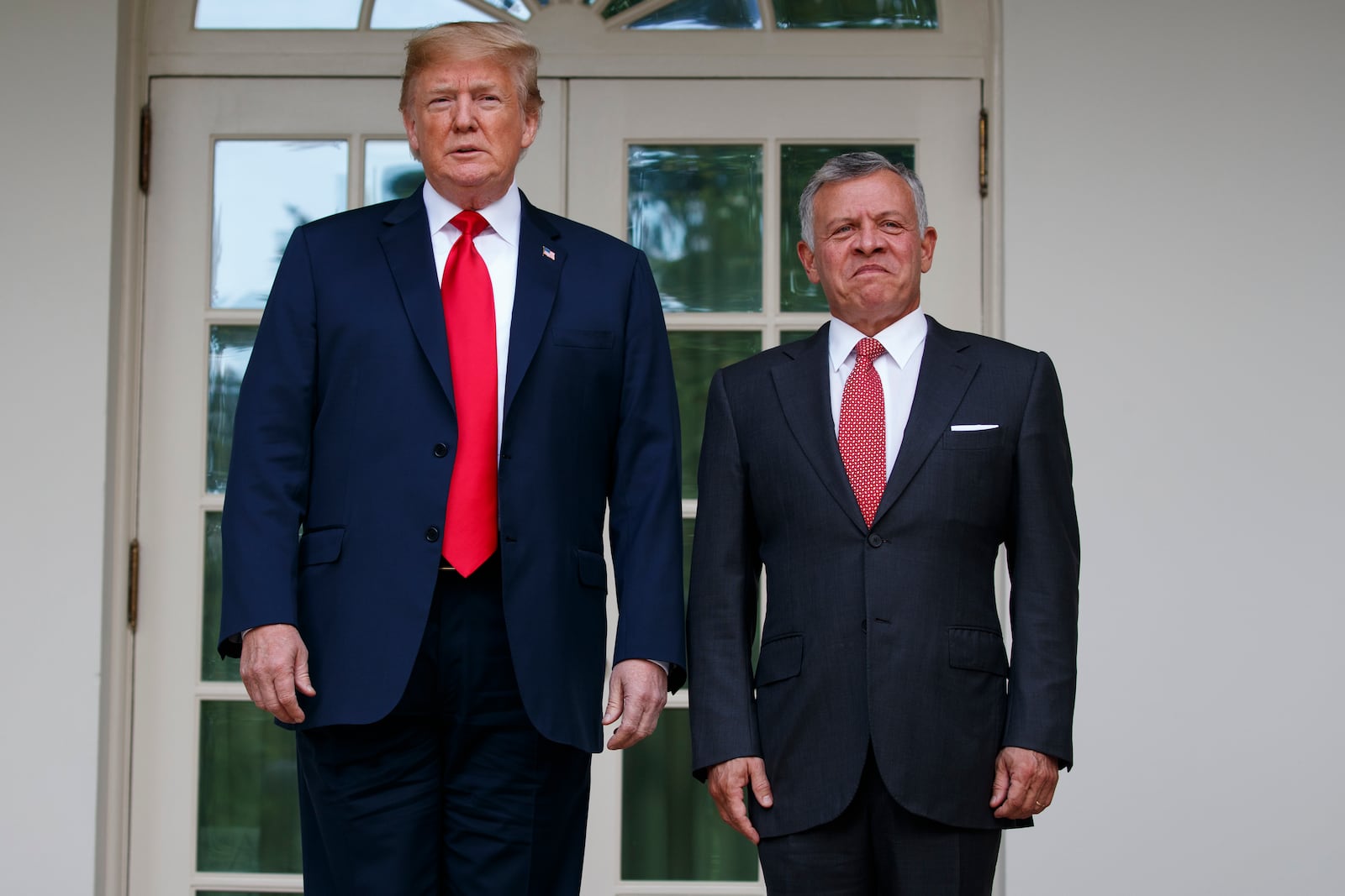 FILE - President Donald Trump stands with Jordan's King Abdullah II at the White House, June 25, 2018, in Washington. (AP Photo/Evan Vucci, File)