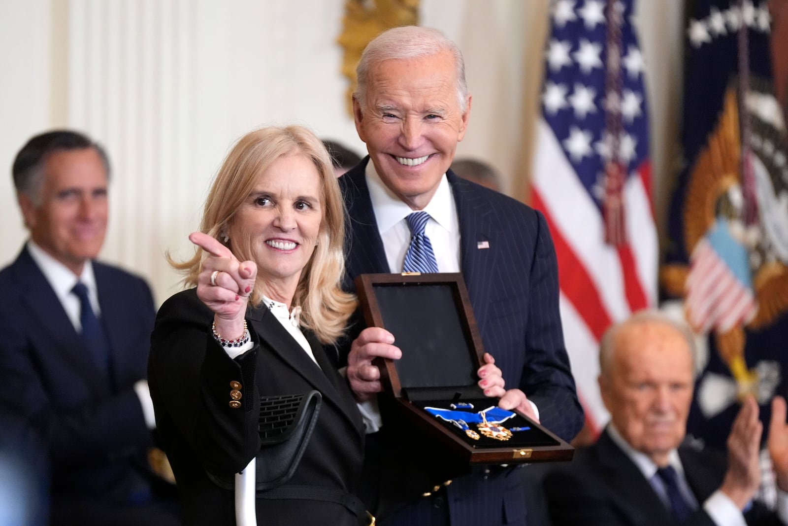 President Joe Biden, right, posthumously presents the Presidential Medal of Freedom, the Nation's highest civilian honor, to Kerry Kennedy on behalf of her late father Robert F. Kennedy in the East Room of the White House, Saturday, Jan. 4, 2025, in Washington. (AP Photo/Manuel Balce Ceneta)