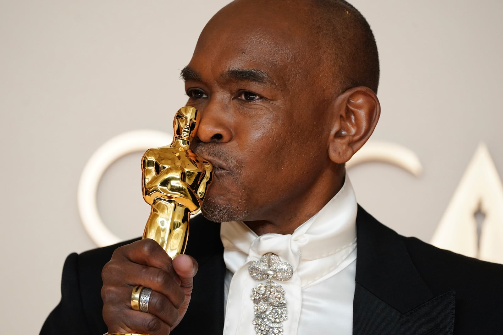 Paul Tazewell, winner of the award for best costume design for "Wicked," poses in the press room at the Oscars on Sunday, March 2, 2025, at the Dolby Theatre in Los Angeles. (Photo by Jordan Strauss/Invision/AP)