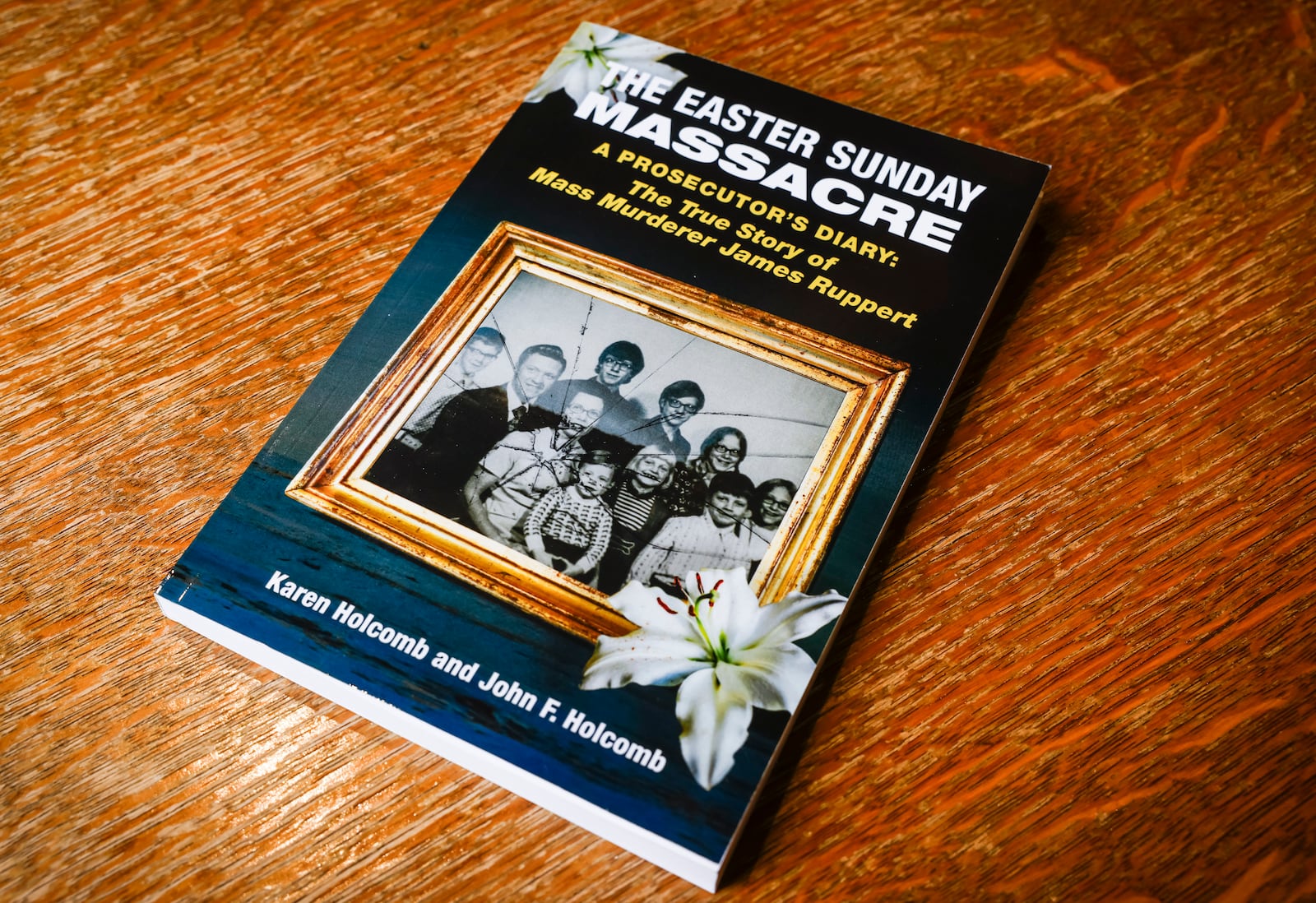 Karen Minnelli Holcomb, daughter-in-law of longtime Butler County Prosecutor John Holcomb, has released a book written from Holcomb's prosecution of the nationally notorious mass murder case of James Ruppert who killed his whole family in Hamilton on Easter Sunday 1975. NICK GRAHAM/STAFF