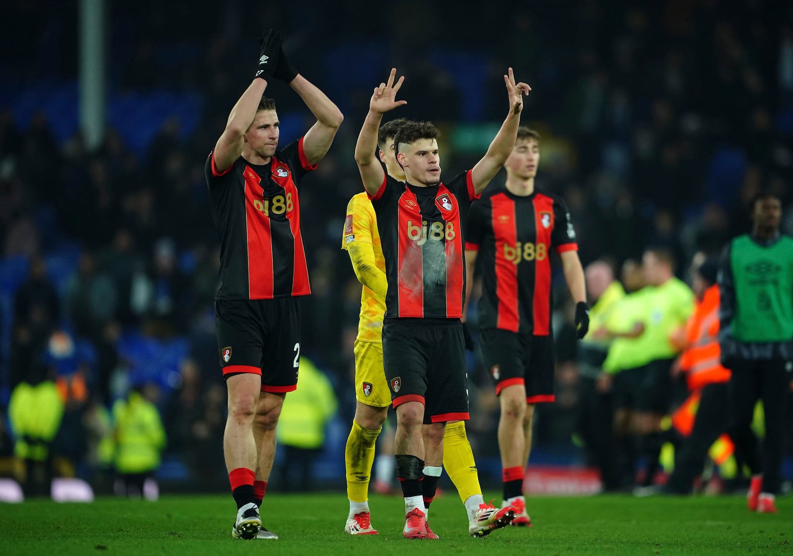 Bournemouth's Illya Zabarnyi, left, and Milos Kerkez celebrate after the English FA Cup fourth round soccer match between Everton and Bournemouth at at Goodison Park, Liverpool, England, Saturday, Feb. 8, 2025. (Peter Byrne/PA via AP)