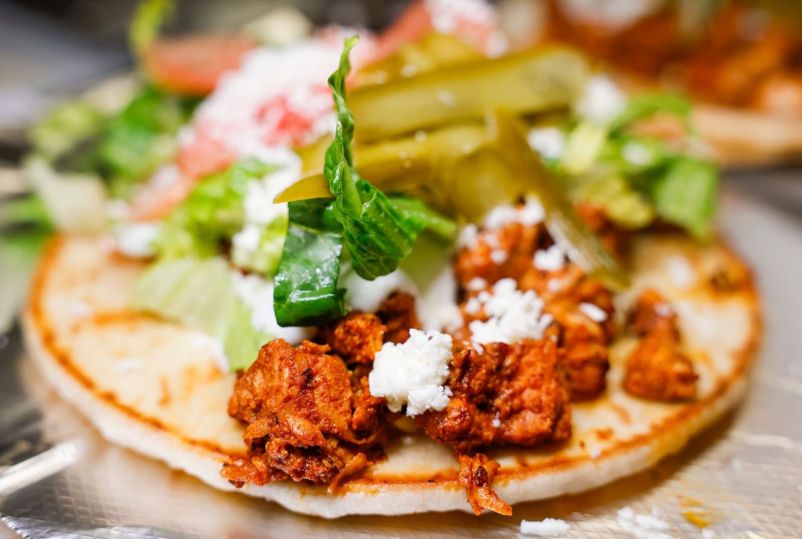 A chicken shawarma pita wrap is served at Tikka Grill in West Chester Township. Tikka Grill has locations on Cincinnati Dayton Road in West Chester Township and inside Jungle Jim's Eastgate. Tikka Grill serves a variety of food items including gyros, pita wraps, subs, Greek salads, shawarma, wings and more.