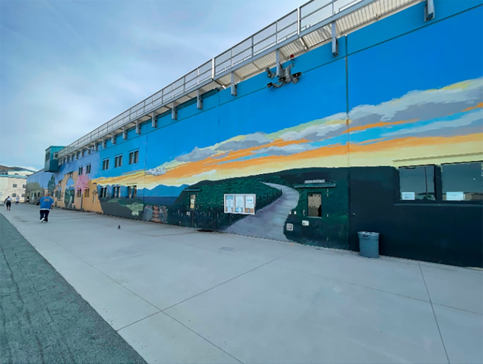 This undated image provided by California Department of Corrections and Rehabilitation shows a mural inside the prison yard at the Richard J. Donovan Correctional Facility in San Diego, where Lyle and Erik Menendez launched a beatification program in 2018. (California Department of Corrections and Rehabilitation via AP)