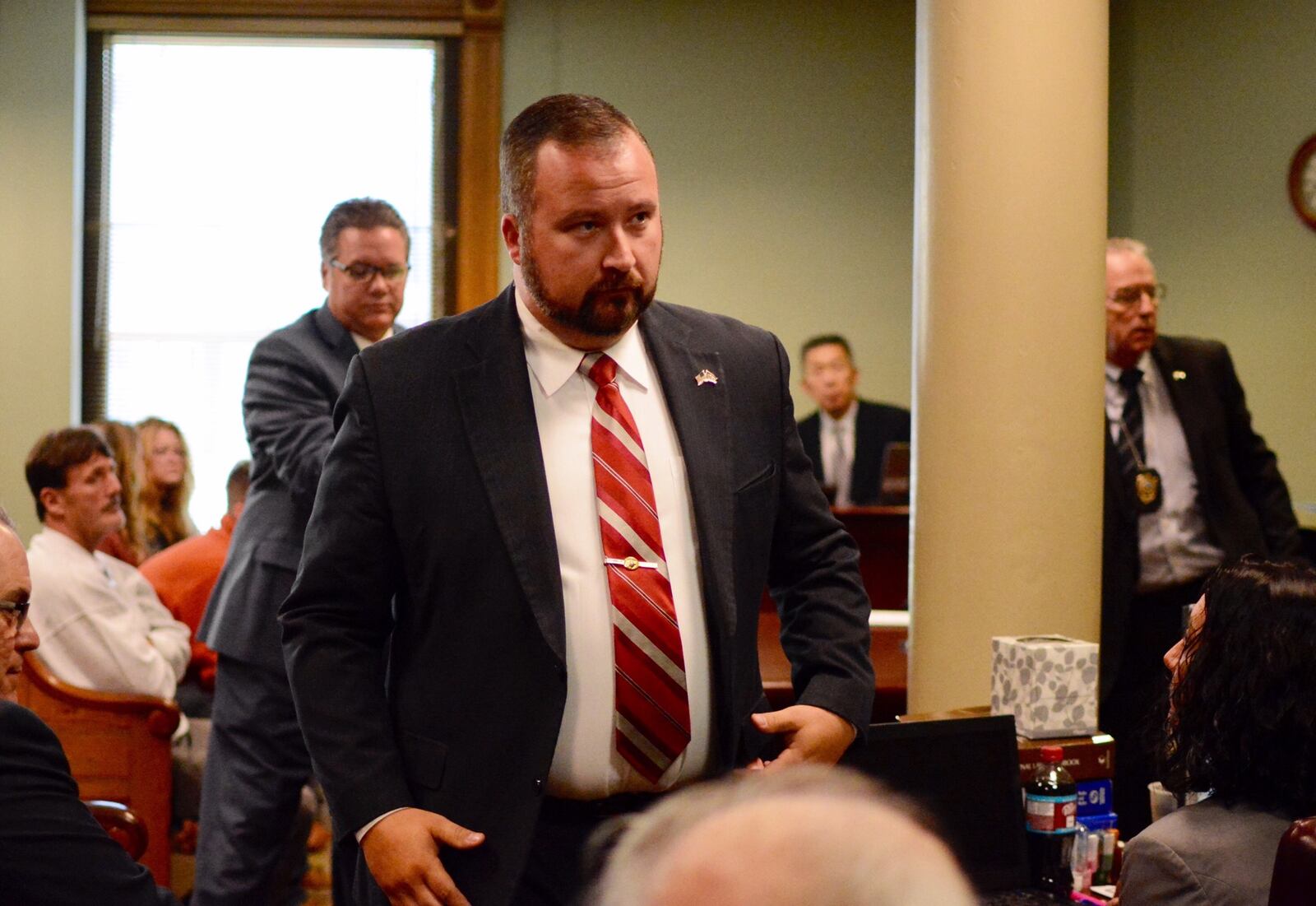 Ohio Rep. Wes Retherford, R-Hamilton, walks out of court Wednesday, May 3, after being found guilty of operating a vehicle while impaired and sentenced. MICHAEL D. PITMAN/STAFF