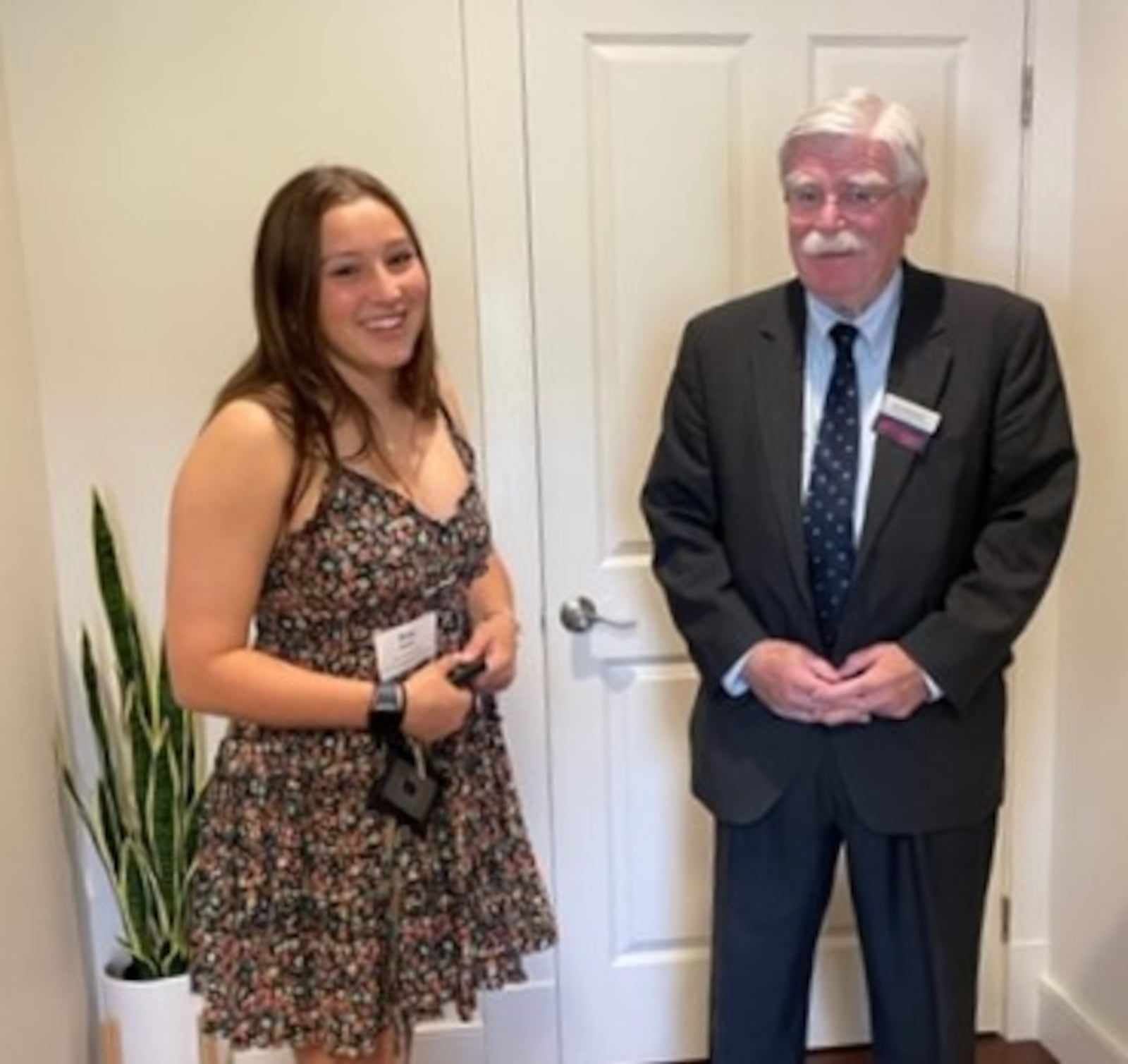 Talawanda senior scholarship recipients were treated to an ice cream social so they could meet not only the scholarship donors but also members of the Greater Oxford Community Foundation. Here, Jim Robinson speaks to Eva Motta, recipient of scholarships from the Oxford Rotary Club and Talawanda Athletic Boosters. CONTRIBUTED