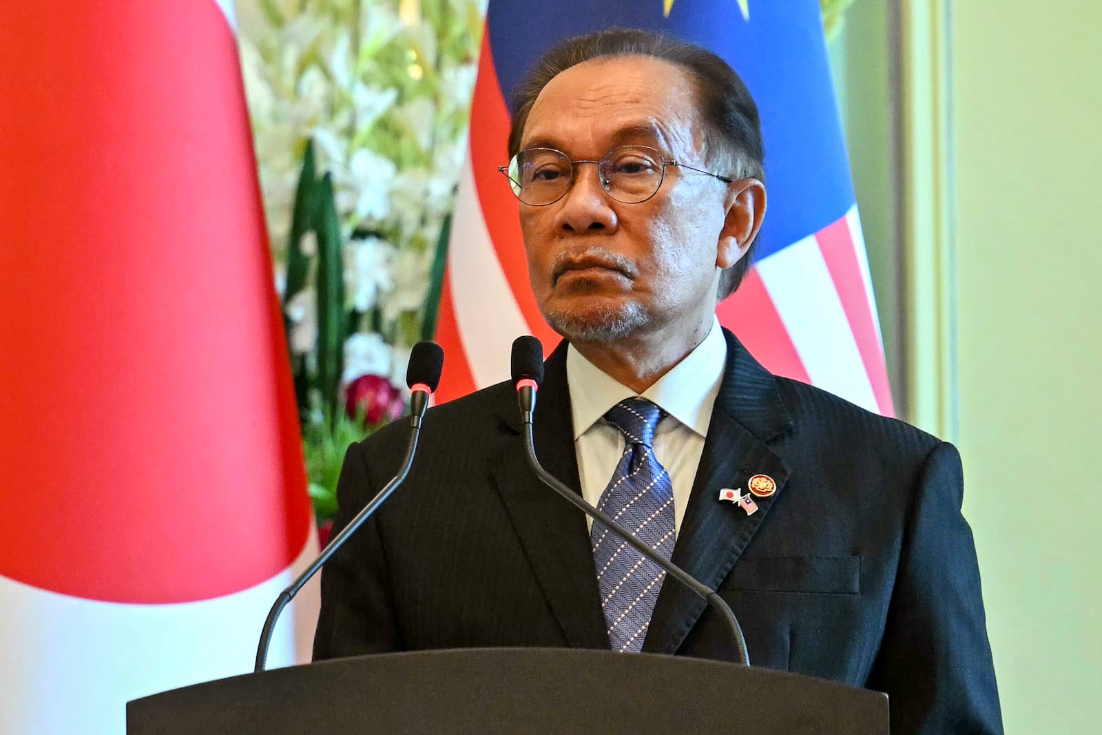 Malaysia's Prime Minister Anwar Ibrahim looks on during a joint press conference with Japan's Prime Minister Shigeru Ishiba at the prime minister's office in Putrajaya, Malaysia, Friday, Jan. 10, 2025. (Mohd Rasfan/Pool Photo via AP)