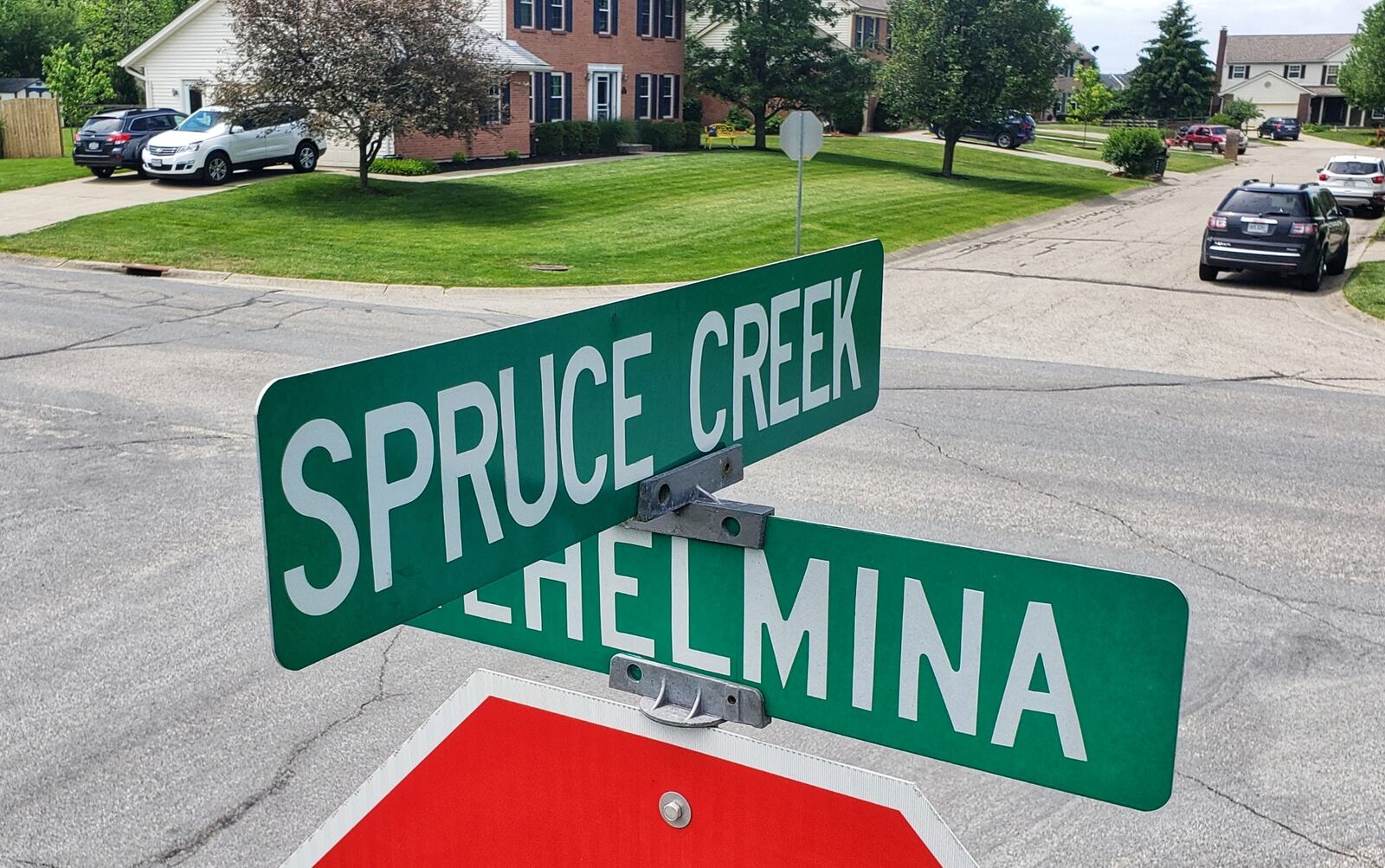 A man was found shot and killed in the street in the 6000 block of Spruce Creek Drive in Liberty Twp. on Tuesday, June 9, 2020. NICK GRAHAM / STAFF