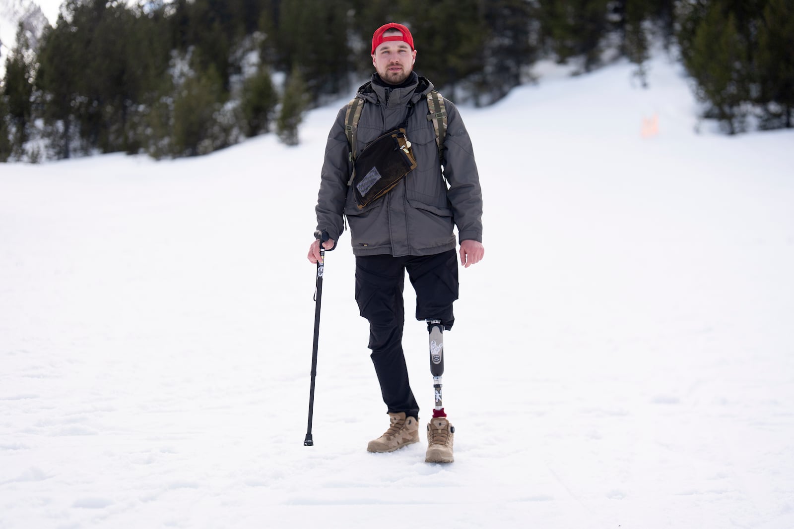 Ukrainian veteran Denys Kryvodubski poses for a photo after a lesson with Oregon Adaptive Sports on the three track skiing method at Hoodoo Ski Area in central Oregon on Thursday, March 6, 2025. (AP Photo/Jenny Kane)