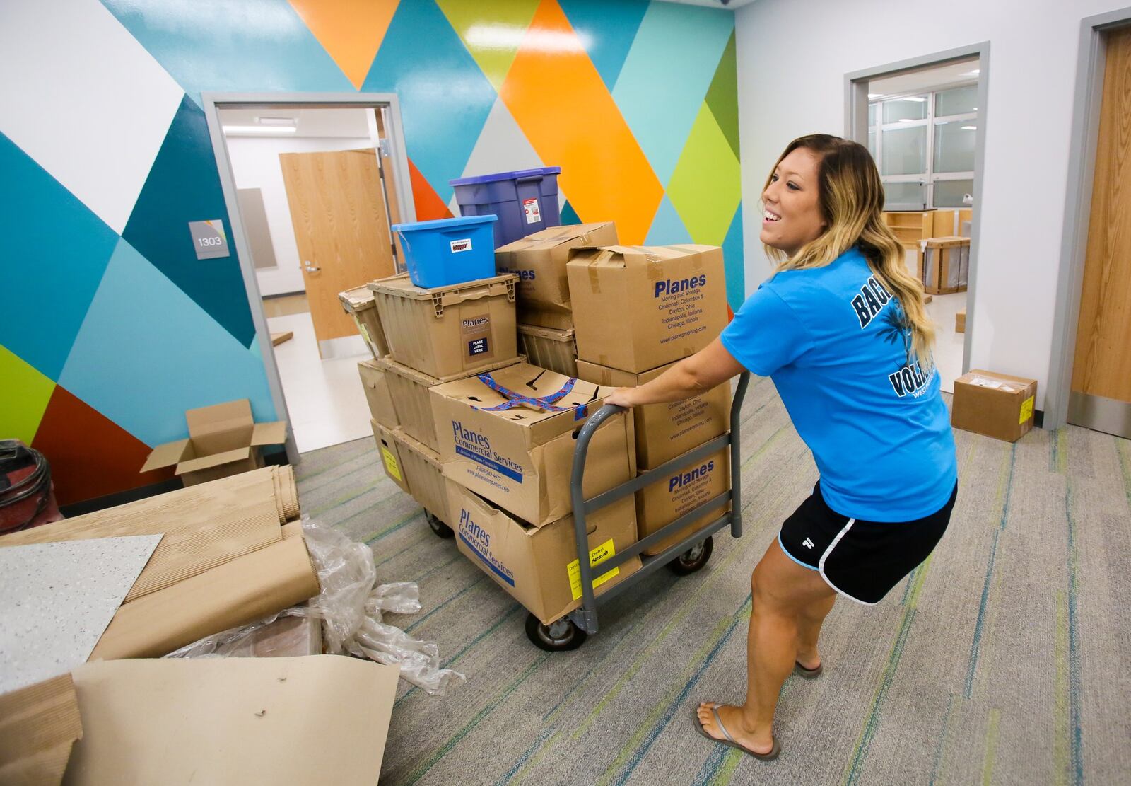 Teachers, including Allison Meyer, who teaches kindergarten, got the first look at their classrooms and started getting organized for the upcoming school year Monday, Aug. 7, at the new Fairfield Central Elementary School. GREG LYNCH / STAFF