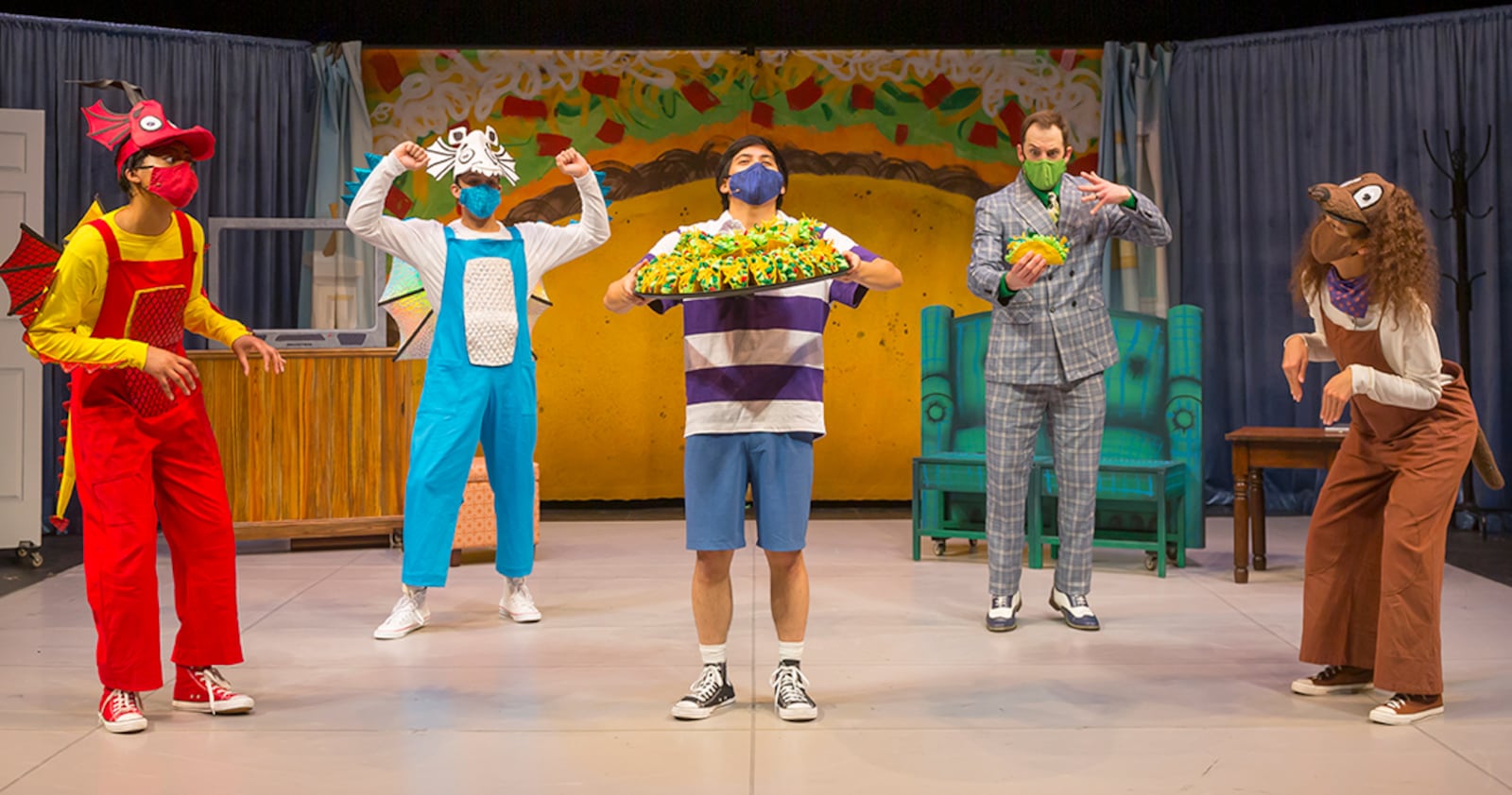 Photo courtesy of Cincinnati Playhouse in the Park/A.J. Baldwin (Red/Yellow Dragons), Kenneth Hamilton (Blue/White Dragons,) Joshua Carandang (Boy,) Phineas Clark (Man in Suit,) and Sydney E. Crutcher (Leroy, a dog.) Photo by Mikki Schaffner. CONTRIBUTED