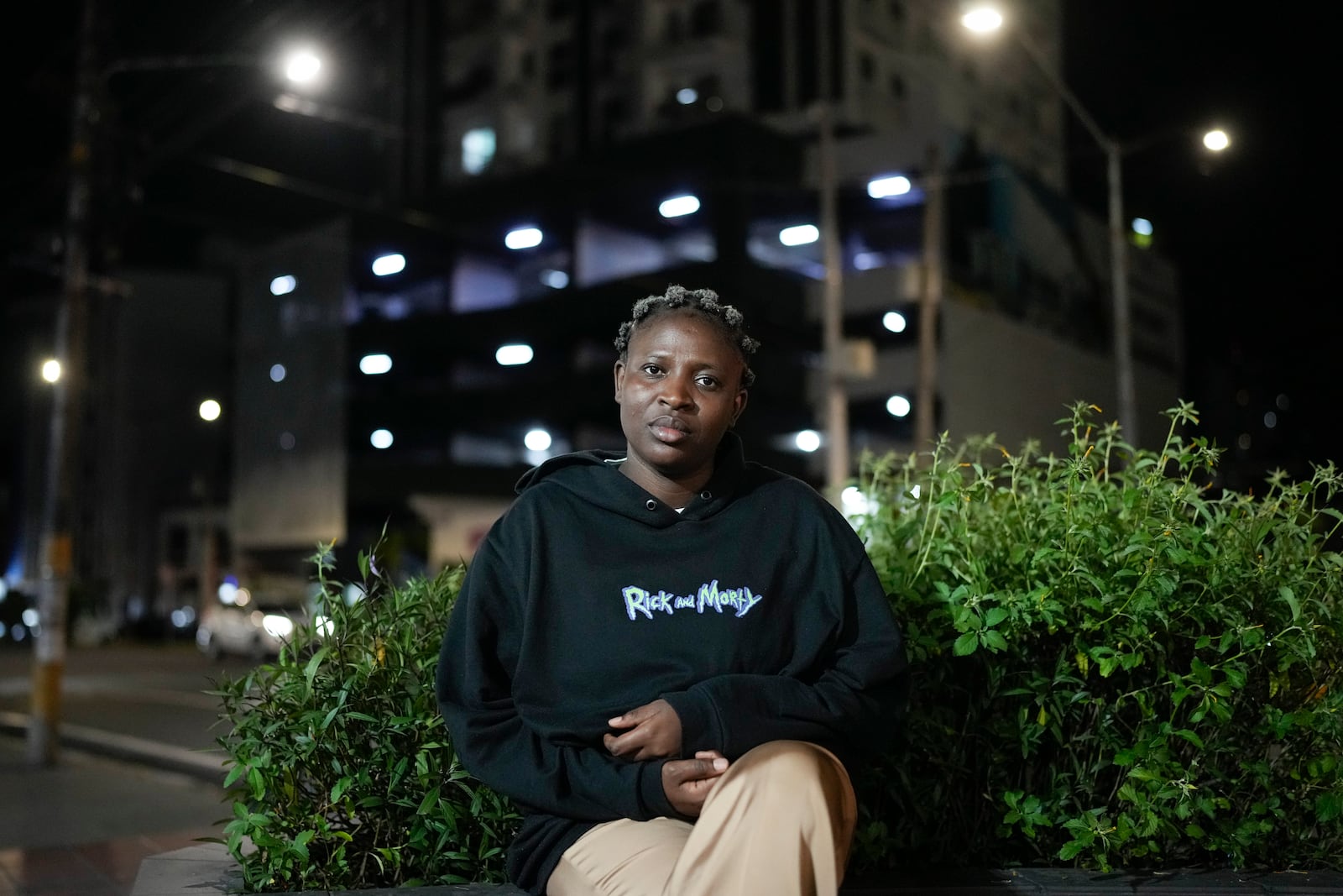 Isha Len, a migrant of Cameroon, poses for a photo in Panama City, Monday, March 10, 2025, after being deported from the U.S., detained for weeks in a Panamanian immigration camp, and released on a temporary humanitarian visa allowing a 30‑day stay. (AP Photo/Matias Delacroix)