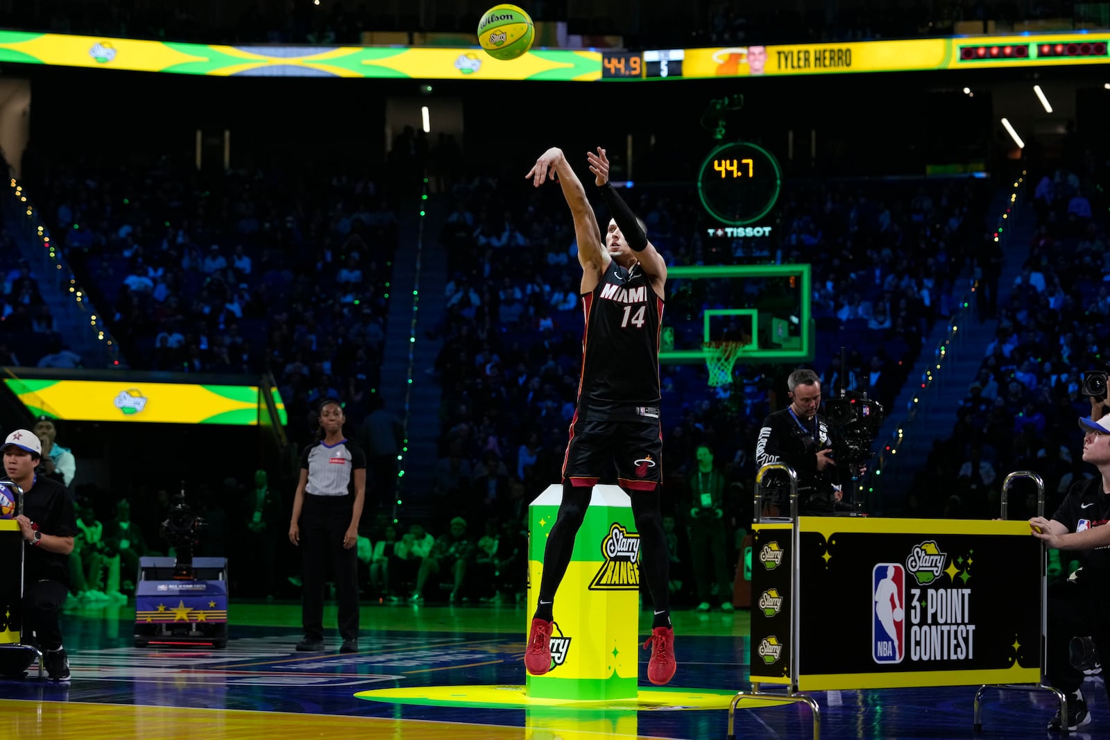 Miami Heat guard Tyler Herro shoots during the 3-point contest at the NBA basketball All-Star Saturday night festivities Saturday, Feb. 15, 2025, in San Francisco. (AP Photo/Godofredo A. Vásquez)