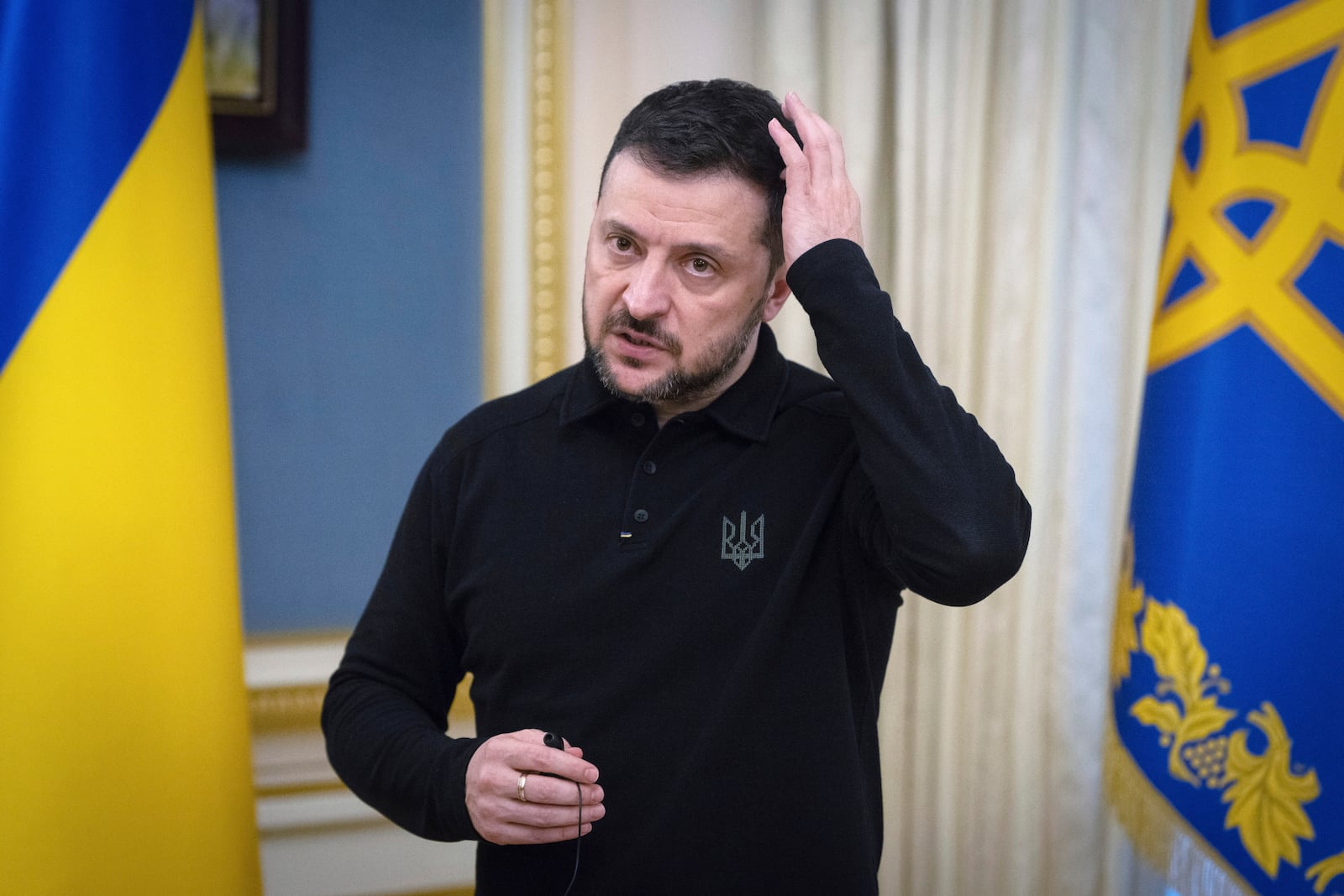 FILE - Ukrainian President Volodymyr Zelenskyy speaks during his briefing in Kyiv, Ukraine, Wednesday, Feb. 5, 2025. (AP Photo/Efrem Lukatsky, File)