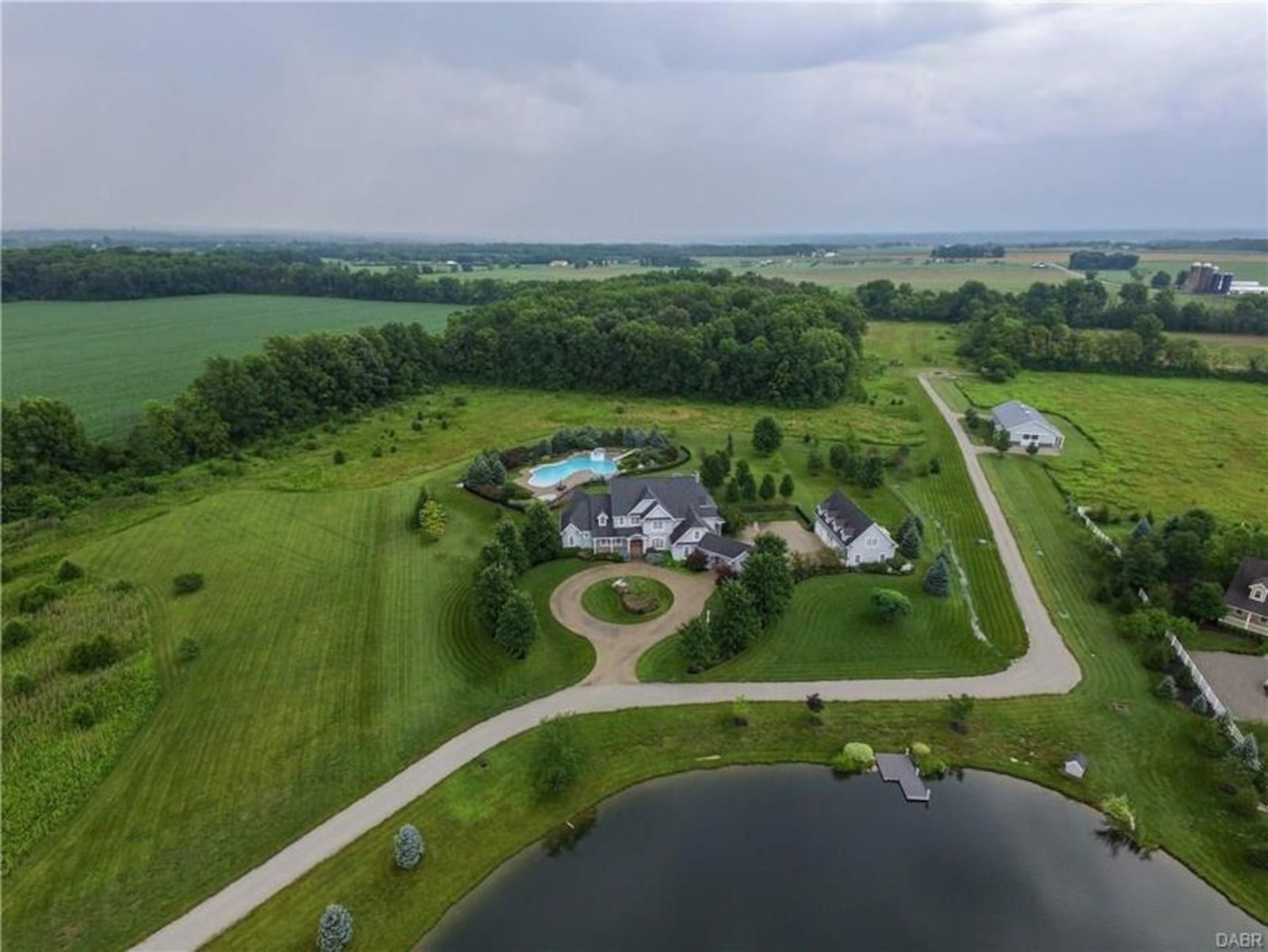 This 5-bedroom rural estate, located at 4950 Utica Road in Clearcreek Twp., features a resort-like pool, stocked pond and 3-stall horse barn. PROVIDED PHOTOS BY ROBINSON SOTHEBY’S INTERNATIONAL REALTY