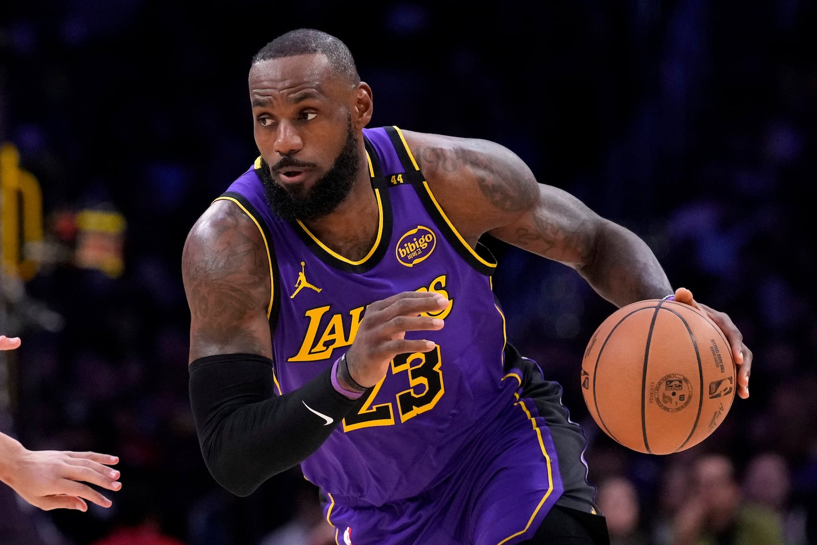 Los Angeles Lakers forward LeBron James drives toward the basket during the first half of an NBA basketball game against the Atlanta Hawks, Friday, Jan. 3, 2025, in Los Angeles. (AP Photo/Mark J. Terrill)