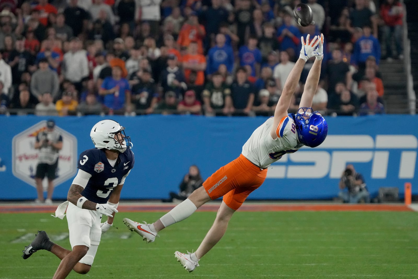 Boise State wide receiver Austin Bolt (81) can't make the catch as Penn State cornerback Jalen Kimber (3) defends during the first half of the Fiesta Bowl NCAA college football CFP quarterfinal game, Tuesday, Dec. 31, 2024, in Glendale, Ariz. (AP Photo/Rick Scuteri)