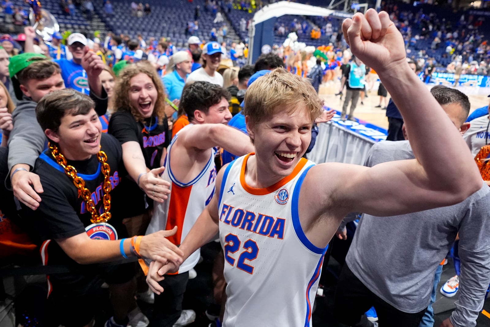 Florida guard Bennett Andersen (22) celebrates with fans after a win over Alabama in an NCAA college basketball game in the semifinals of the Southeastern Conference tournament, Saturday, March 15, 2025, in Nashville, Tenn. (AP Photo/George Walker IV)