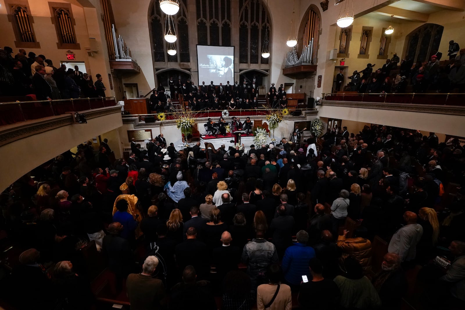 Senior Pastor of The Abyssinian Baptist Church, Reverend Dr. Kevin R. Johnson gives the benediction during a ceremony in celebration of Roberta Flack's life at The Abyssinian Baptist Church on Monday, March 10, 2025, in New York. (AP Photo/Richard Drew)