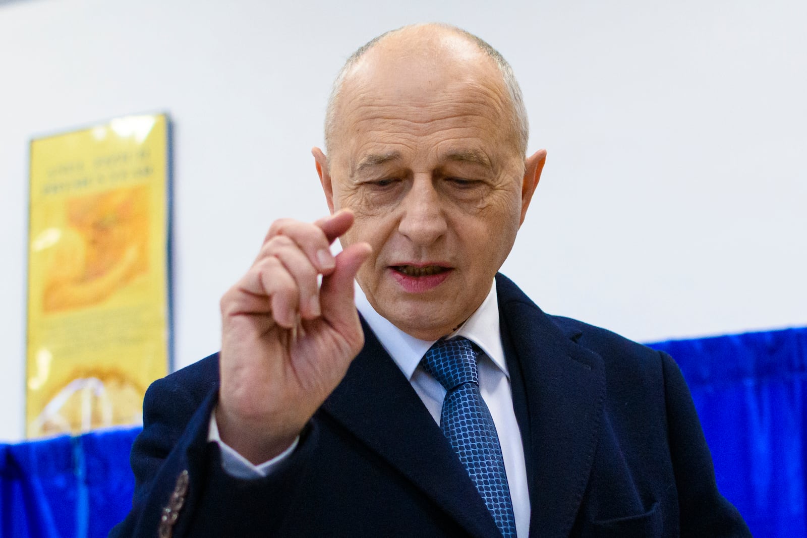 Former NATO Deputy Secretary General Mircea Geoana, running as an independent candidate for president, gestures after casting his vote in the country's presidential elections, in Bucharest, Romania, Sunday, Nov. 24, 2024. (AP Photo/Alexandru Dobre)