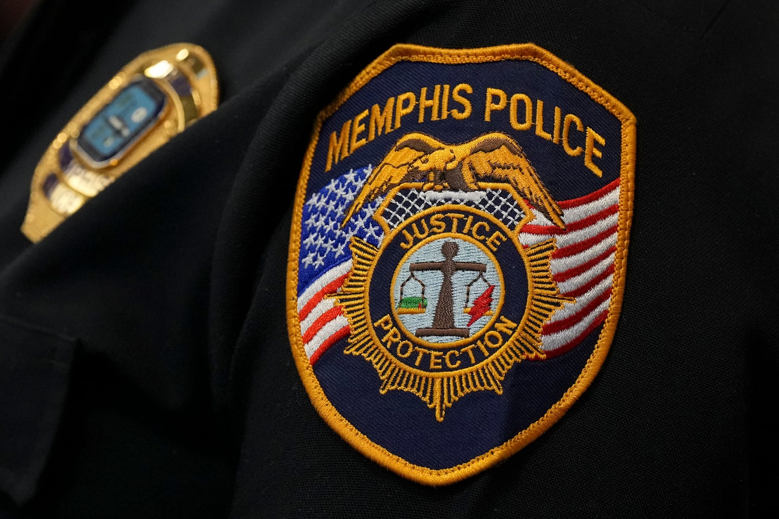 A Memphis Police patch is seen during a news conference Thursday, Dec. 5, 2024, in Memphis, Tenn. (AP Photo/George Walker IV)