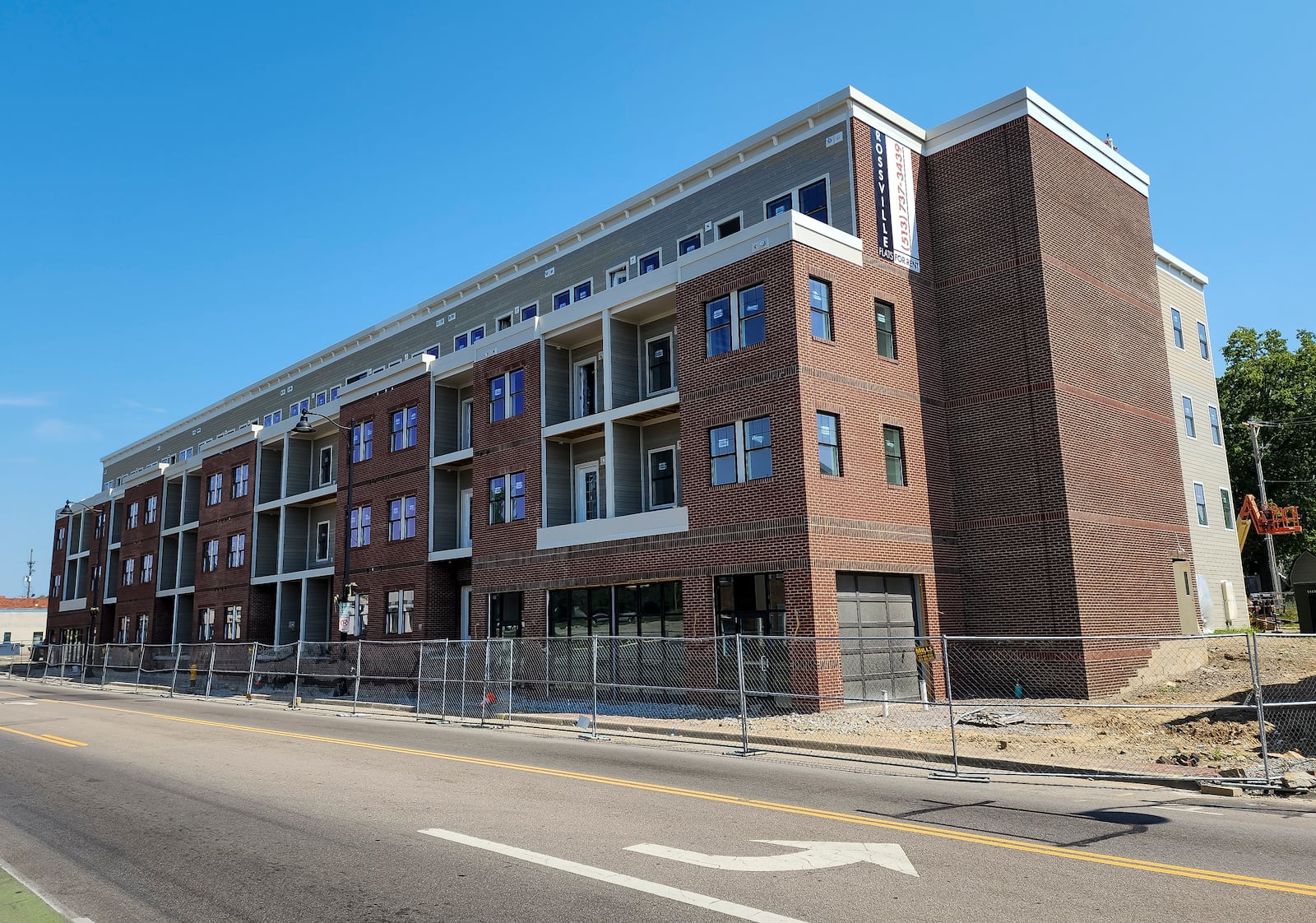 Construction continues on the Rossville Flats apartments with street level retail space on Main Street in Hamilton. NICK GRAHAM/STAFF