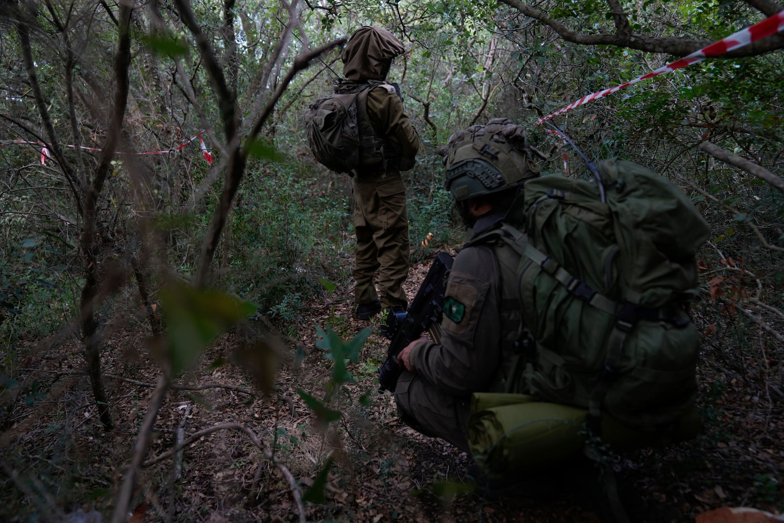 Israeli soldiers are seen during a ground operation in southern Lebanon, near the border with Israel, Sunday, Oct. 13, 2024. (AP Photo/Sam McNeil)