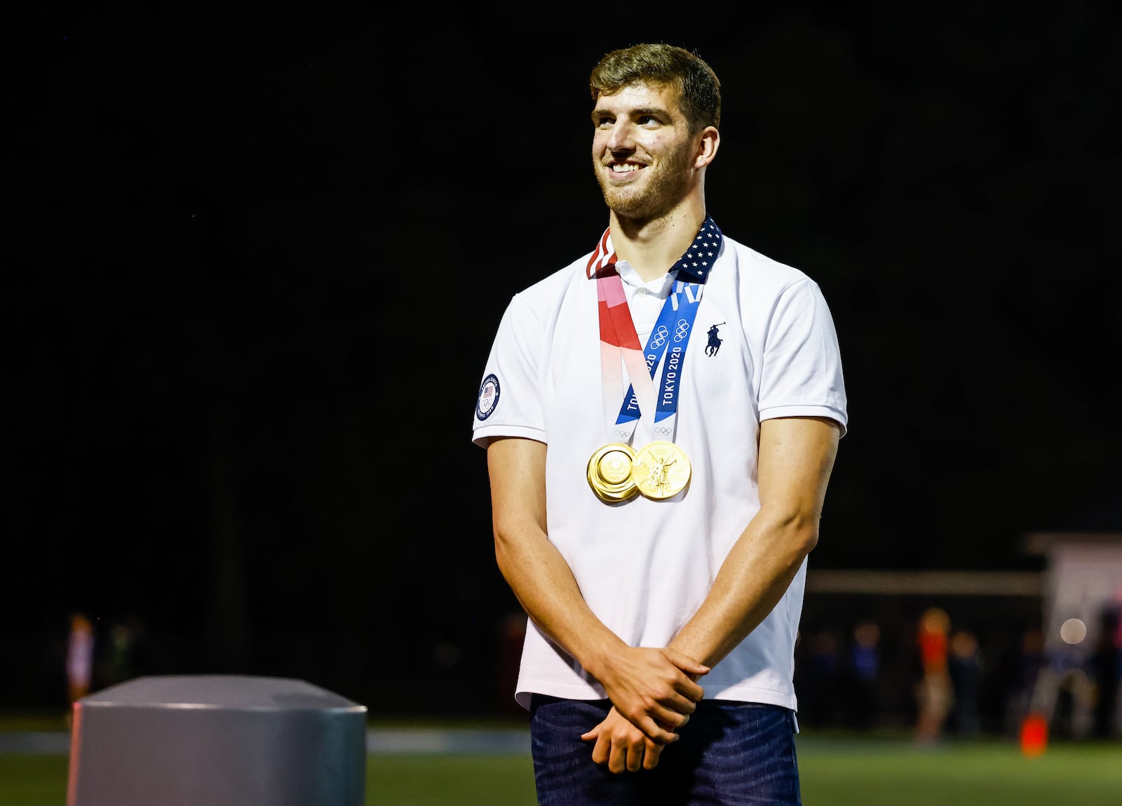 Trenton native and 2015 Edgewood High School graduate Zach Apple was honored at halftime of the Edgewood football game Friday, Oct. 8, 2021 at Edgewood's Kumler Field. Apple won two gold medals for swimming in the 2020 Tokyo Olympics held this year. NICK GRAHAM / STAFF