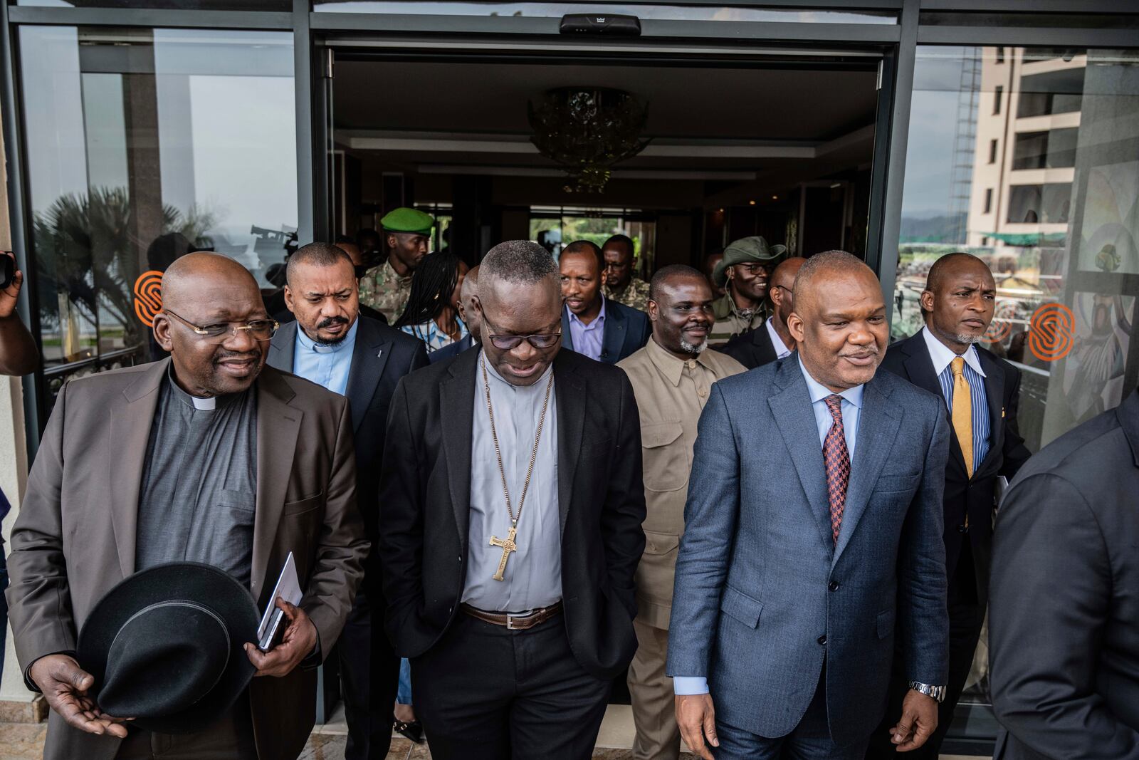 Members of the National Episcopal Conference of Congo and the Church of Christ arrived for a meeting with the Leader of the political military coalition in Goma, Democratic Republic of the Congo, Wednesday, Feb. 12, 2025. (AP Photo/Moses Sawasawa)