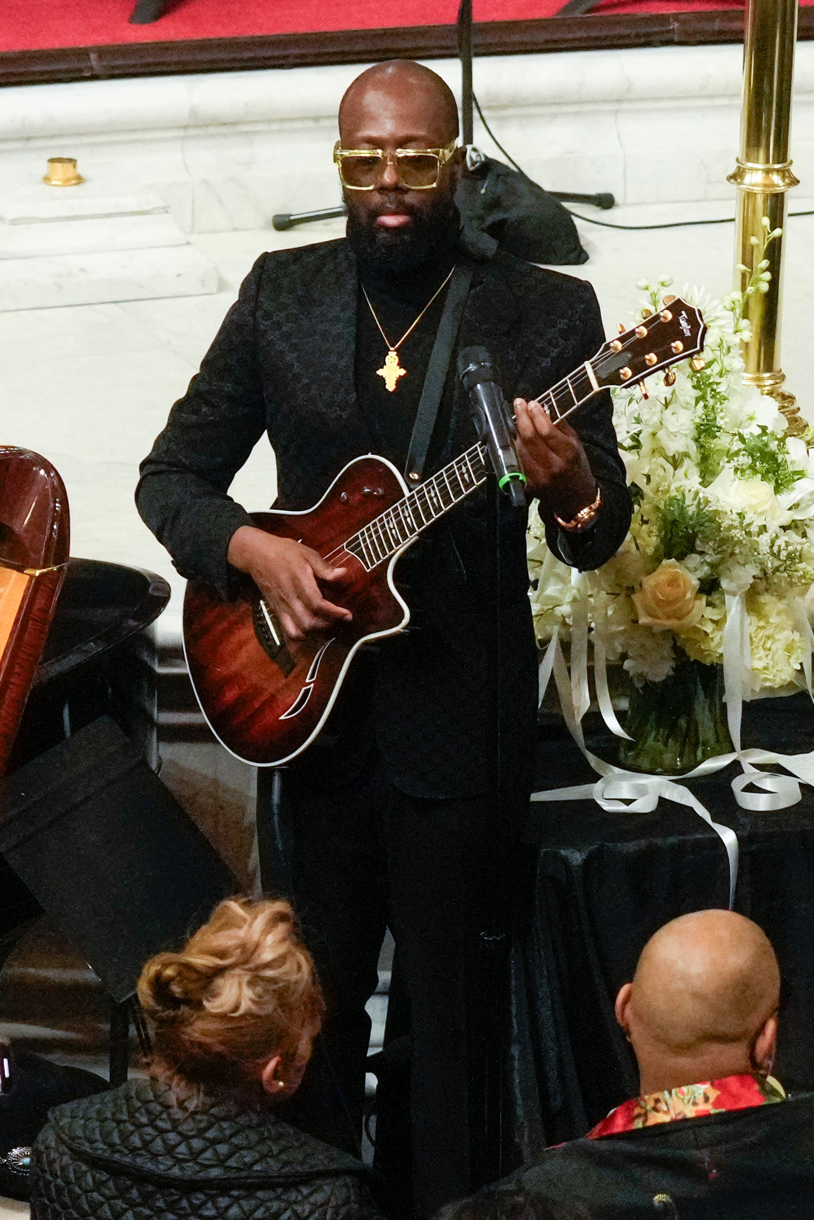 Wyclef Jean of the Fugees performs during a ceremony in celebration of Roberta Flack's life at The Abyssinian Baptist Church on Monday, March 10, 2025, in New York. (AP Photo/Richard Drew)