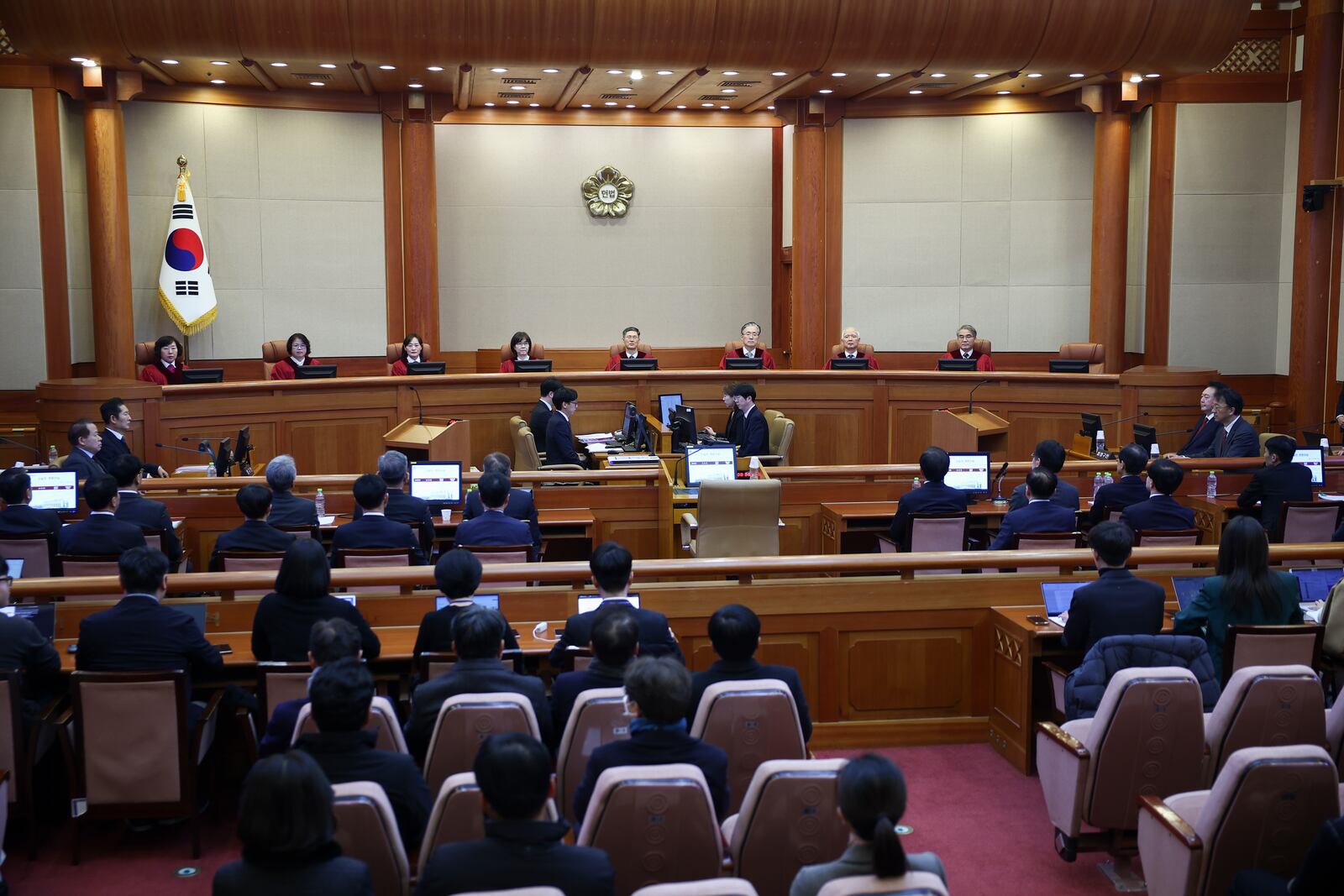 Impeached South Korean President Yoon Suk Yeol, far right, attends his impeachment trial at the Constitutional Court in Seoul, South Korea, Tuesday, Jan. 21, 2025. (Kim Hong-Ji/Pool Photo via AP)