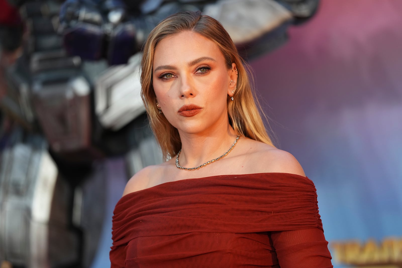 FILE - Scarlett Johansson poses for photographers upon arrival at the premiere for the film 'Transformers One' o, Sept. 19, 2024, in London. (Photo by Scott A Garfitt/Invision/AP, File)