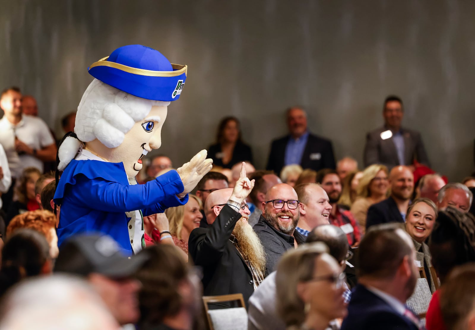 Hamilton 17Strong mascot Xander sits in the crowd during the Hamilton State of the City address Thursday, Oct. 5, 2023 at Courtyard by Marriott in Hamilton. NICK GRAHAM/STAFF