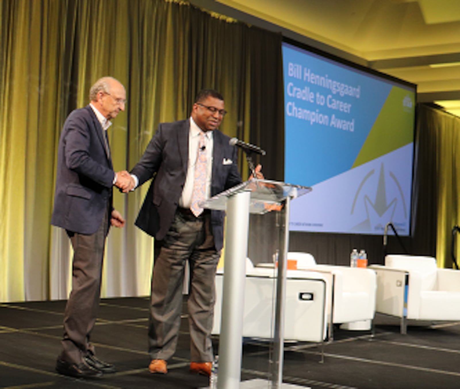 Dr. Tom Lasley accepts the Cradle to Career Champion Award from Dr. Russell W. Booker, StriveTogether board chair, during the 2023 StriveTogether National Convening in San Francisco, Calif.  After serving as dean of education at the University of Dayton, he founded Learn to Earn Dayton to increase the number of adults in Montgomery County with a college degree/credential to 60%. CONTRIBUTED