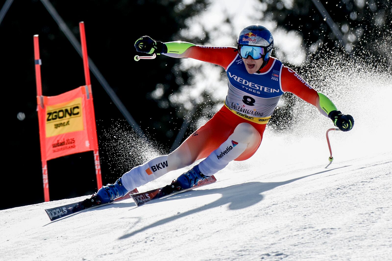 Switzerland's Marco Odermatt speeds down the course during a men's Super-G, at the Alpine Ski World Championships, in Saalbach-Hinterglemm, Austria, Friday, Feb. 7, 2025. (AP Photo/Gabriele Facciotti)