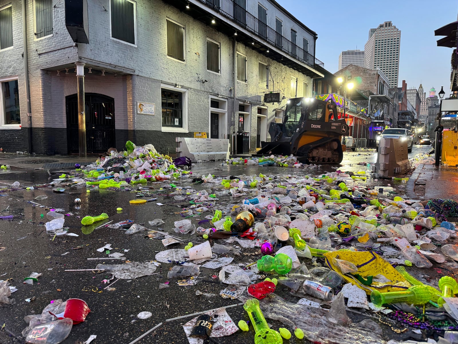 Piles of Mardi Gras detritus accumulated from Mardi Gras celebrations lies in the French Quarter in New Orleans, on Ash Wednesday, March 5, 2025. (AP Photo/Jack Brook)