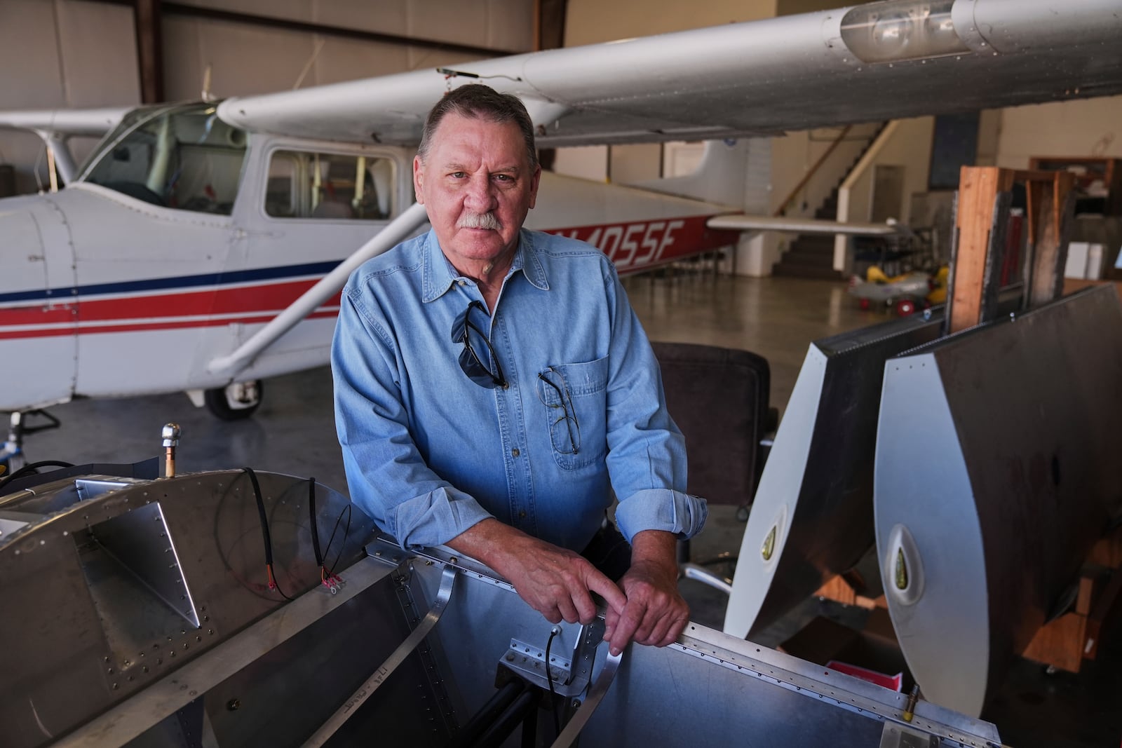 Former Army and Navy Vietnam veteran Richard Lamb, poses for a photo at the EAA Museum at McGregor Executive Airport in McGregor, Texas, Sunday, March 2, 2025. (AP Photo/Tony Gutierrez)