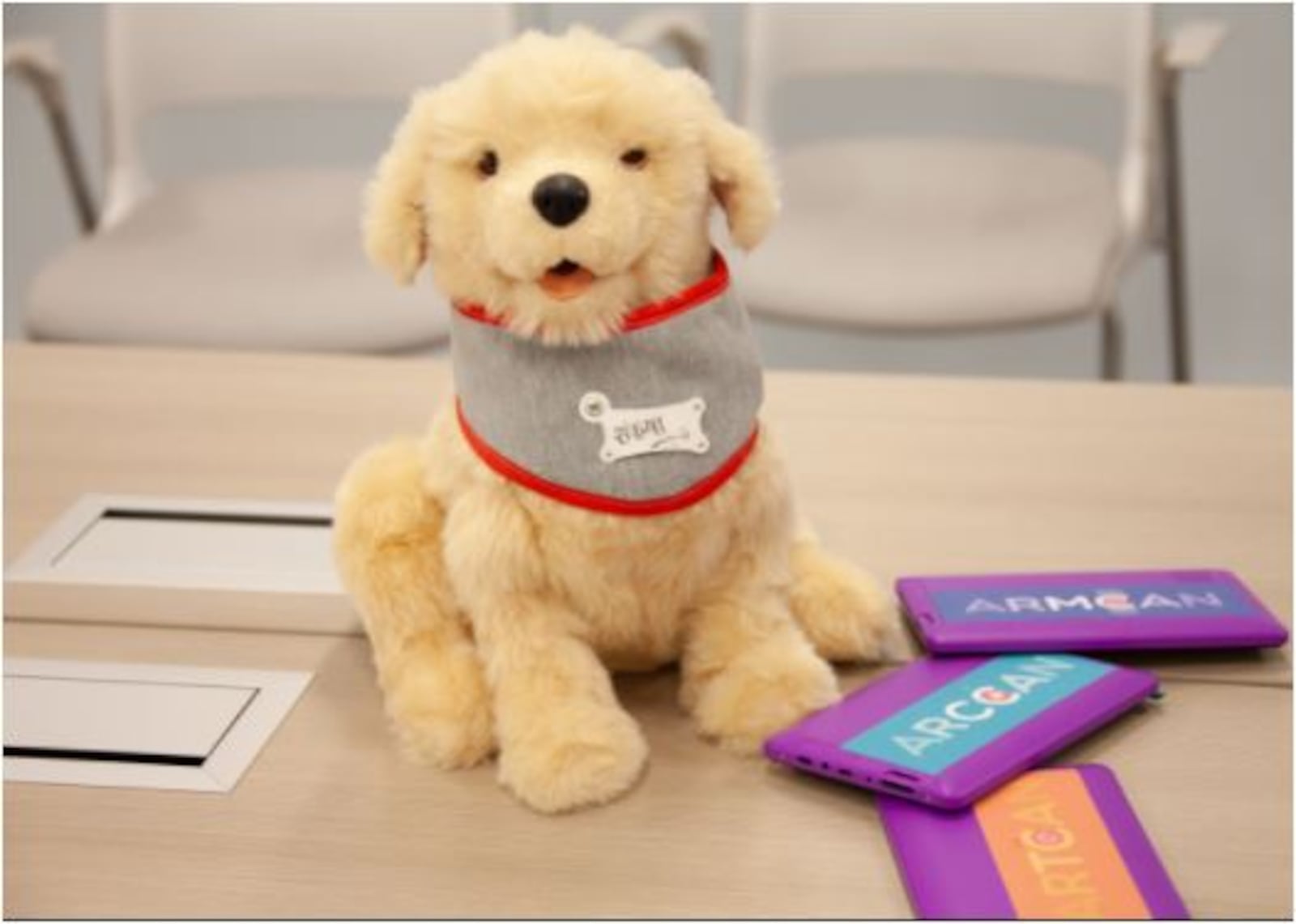 Researchers are investigating how robotic dogs, sold by the company Ageless Innovation, and art therapy can reduce depression in patients. The dogs in the study wear "smart bandanas" that monitor how often people in the study interact with the pets. PROVIDED