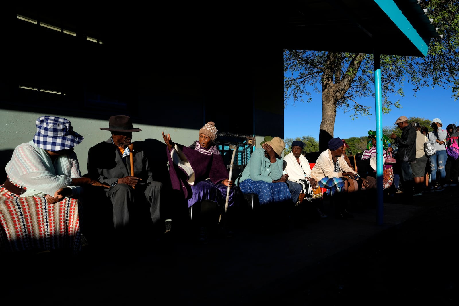 Residents wait for their turns to cast their votes during an election to decide if it keeps faith with one of the Africa's longest-ruling parties, in Gaborone, Botswana, Wednesday, Oct. 30, 2024. (AP Photo/Themba Hadebe)