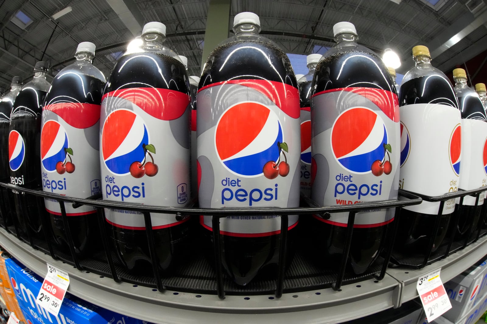 FILE - Bottles of Diet Pepsi Wild Cherry are displayed at a market in Pittsburgh, Jan. 26, 2023. (AP Photo/Gene J. Puskar, File)