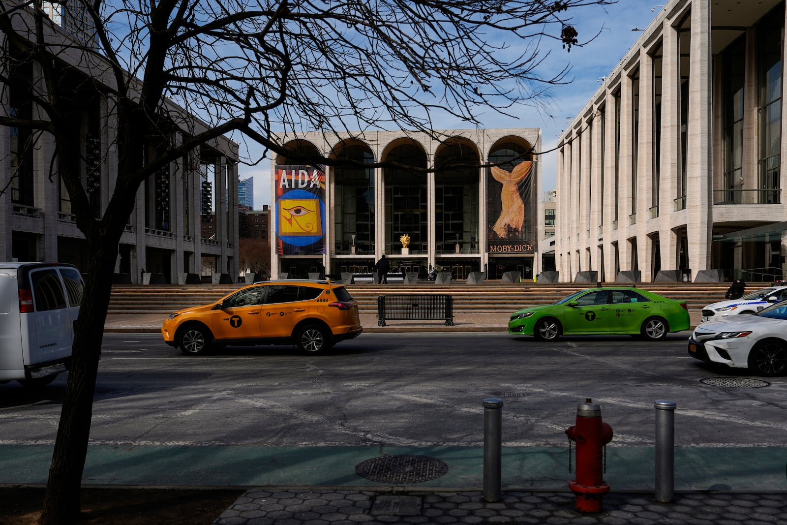 Cars drive past Lincoln Center, Tuesday, Feb. 25, 2025, in New York. (AP Photo/Julia Demaree Nikhinson)