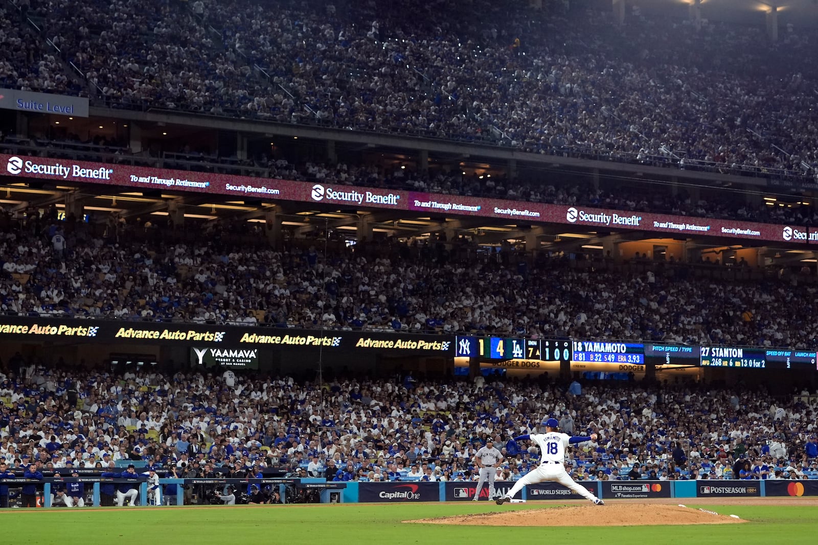 Los Angeles Dodgers starting pitcher Yoshinobu Yamamoto (18) throws against the New York Yankees during the seventh inning in Game 2 of the baseball World Series, Saturday, Oct. 26, 2024, in Los Angeles. (AP Photo/Godofredo A. Vásquez)