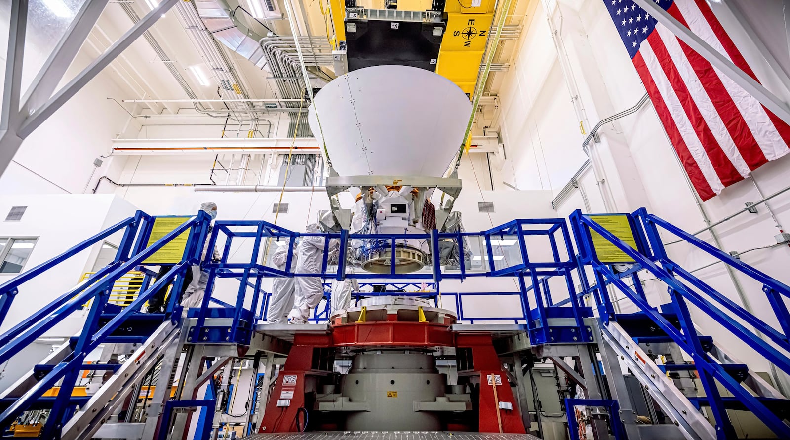 This image provided by NASA shows NASA’s SPHEREx observatory undergoing testing at BAE Systems in Boulder, Colo., in Aug. 2024. (NASA via AP)