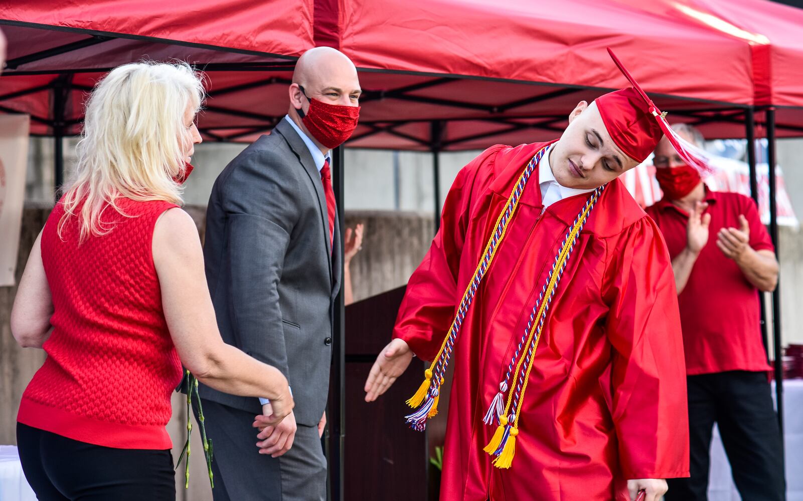 Madison High School drive-thru graduation ceremony at Land of Illusion