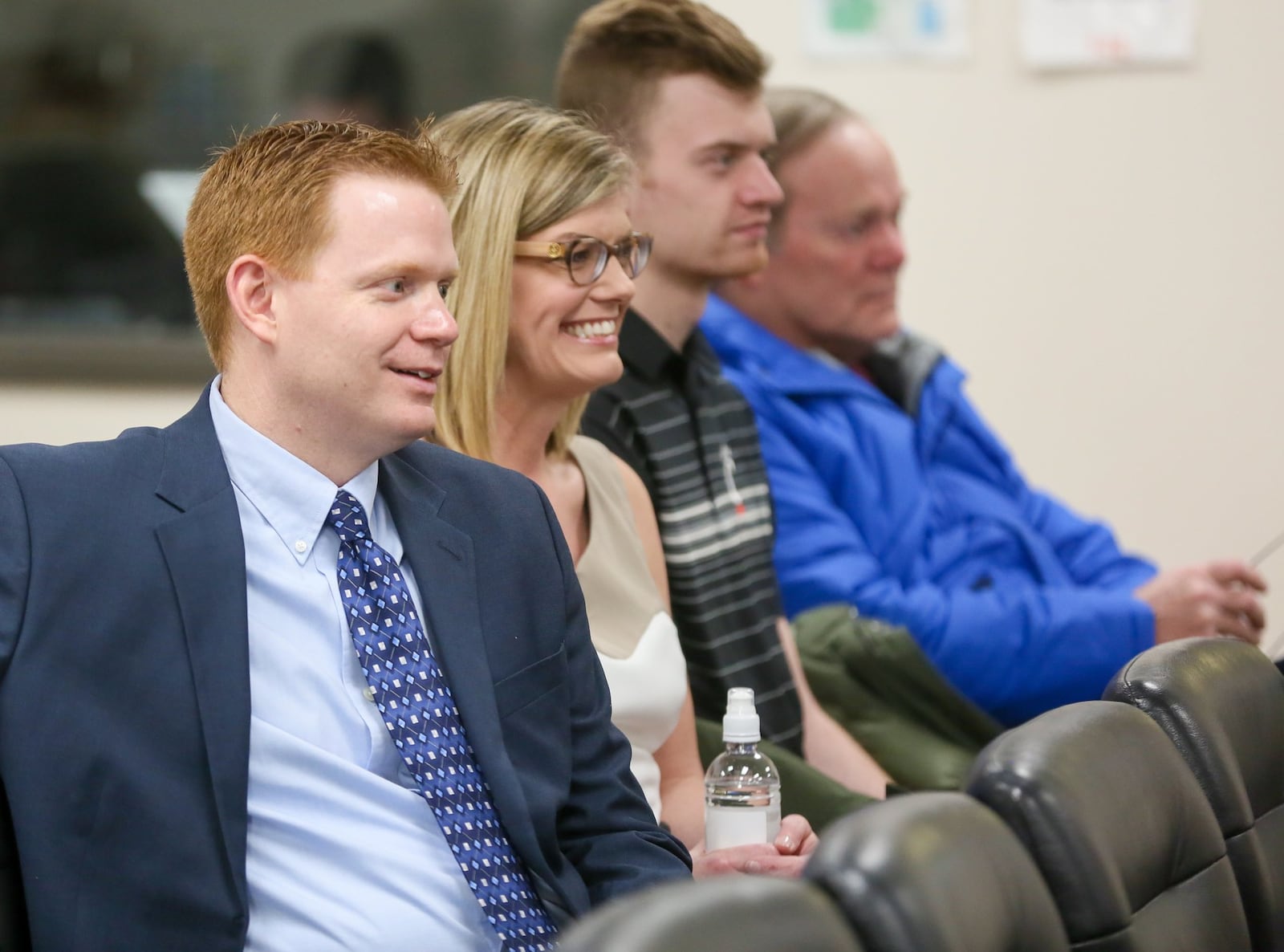 New Lakota Superintendent Matt Miller was joined by his wife Kristy, his son Mason and his father Jim during a special Lakota School board meeting Friday, Feb. 10, to formally vote to approve his new position. GREG LYNCH / STAFF