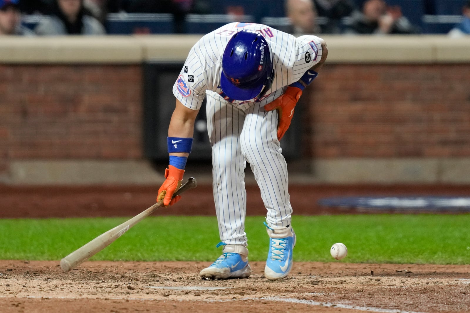 New York Mets' Francisco Alvarez gets hit by pitch against the Los Angeles Dodgers during the fifth inning in Game 4 of a baseball NL Championship Series, Thursday, Oct. 17, 2024, in New York. (AP Photo/Ashley Landis)