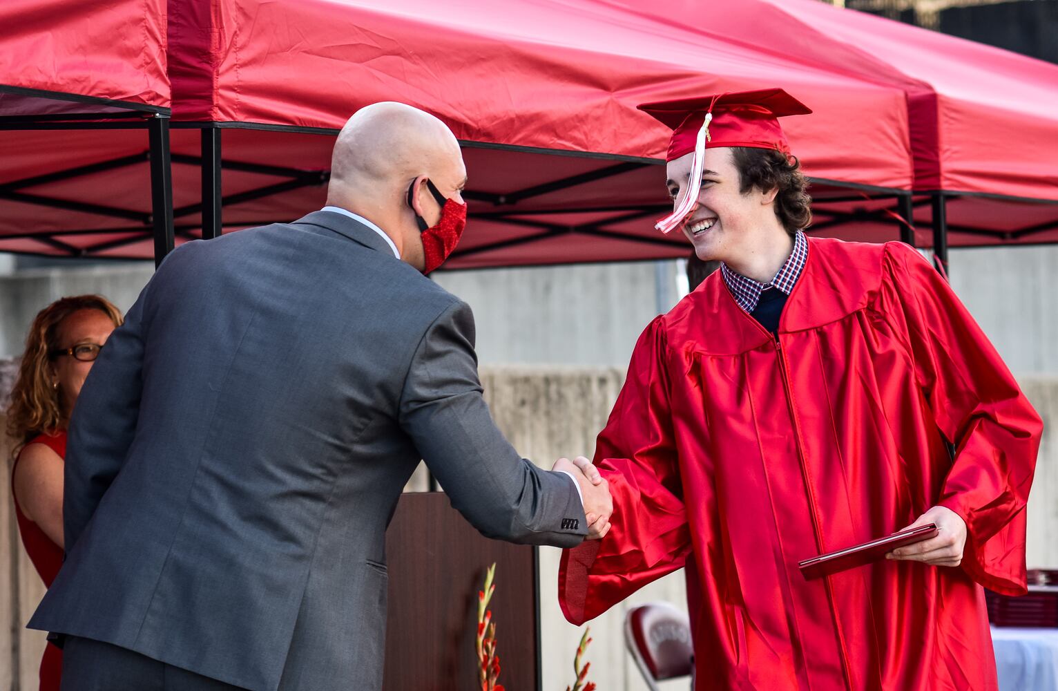 Madison High School drive-thru graduation ceremony at Land of Illusion