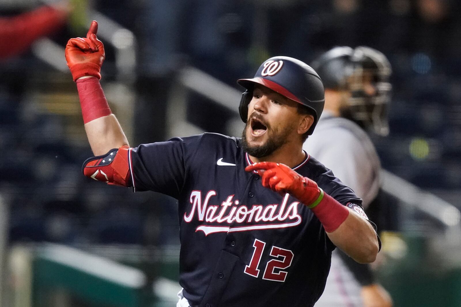 Washington Nationals' Kyle Schwarber, a Middletown High School graduate, celebrates as he runs the bases after his two-run game-winning homer during the 10th inning against the Miami Marlins at Nationals Park. Church leaders, along with Schwarber, are spearheading the Middie Way Baseball League for students in grades kindergarten through fifth. Alex Brandon / AP